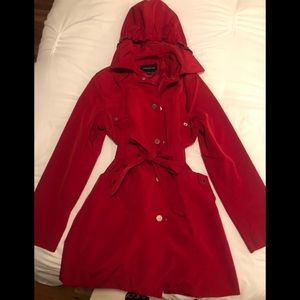 Woman’s London Fog rain coat